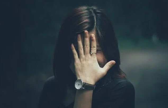 A woman who seem to be shy but an introvert