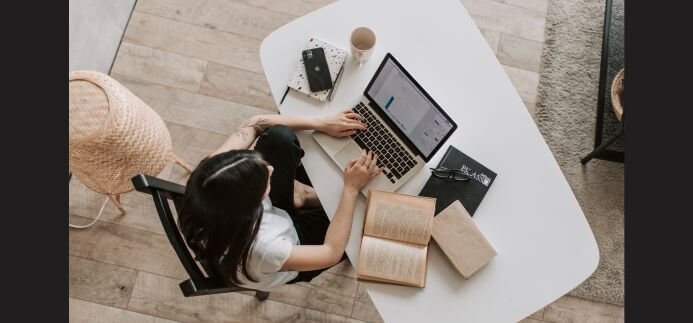 A lady working from home applying productivity hacks