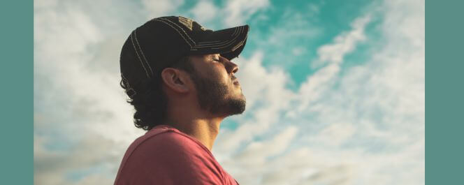 A man in a serene environment harnessing the power of mindfulness