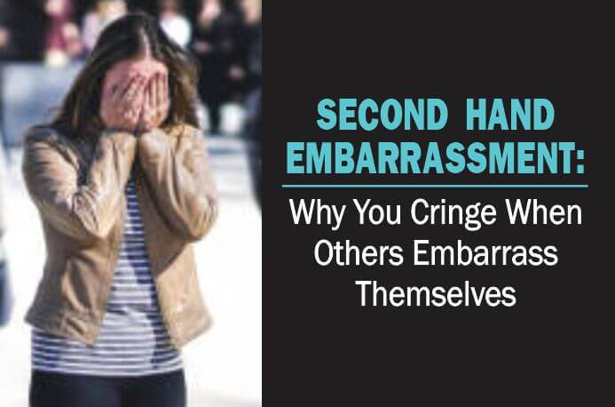 A lady covers her face in response to second hand embarrassment