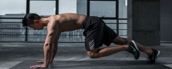 A real man doing exercise in the gym