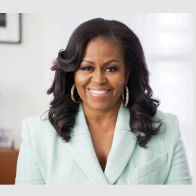 A happy Michelle Obama is among women who identified with her womanhood confidently