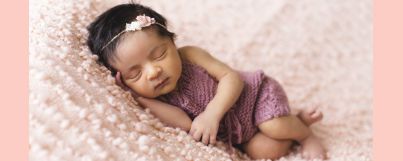 An infant in a deep sleep, demonstrating how mindfulness practices can induce better sleep