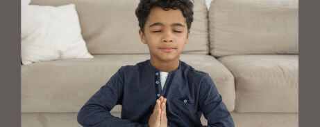 A boy applying Beginners' Mind, one of the 7 pillars of mindfulness