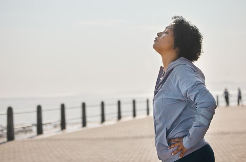 Mindfulness for Chronic Pain: How Present Awareness Can Transform Your Pain Experience 3 A lady who hast mastered mindfulness for chronic pain
