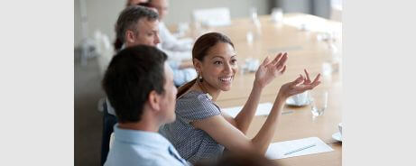 A lady using emotional persuasion on her colleagues