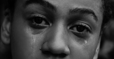 A girl shading tears to demonstrate how emotions can be used to shape behaviour