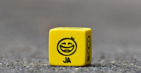 A cube with a smiley depicting emotional