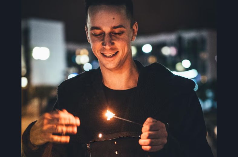 Human Instincts: Understanding the Innate Drives That Shape Us 5 A man removing his hand quickly from fire