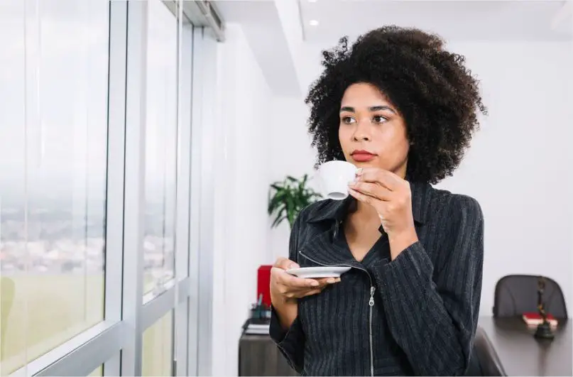 A lady observing table manners 