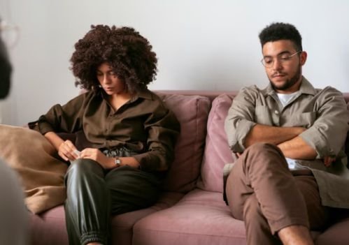 A couple not talking to each other because of emotional infidelity